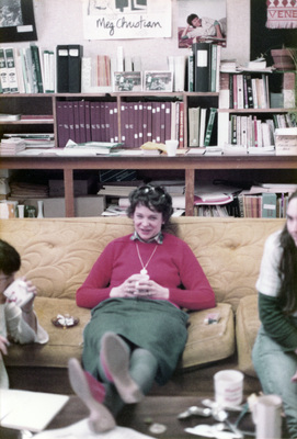 Woman sitting on a couch in the Women's Center