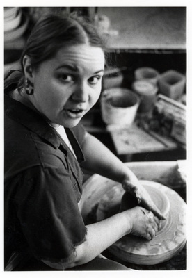 Unidentified woman at a pottery wheel