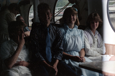 Children sit at a wedding