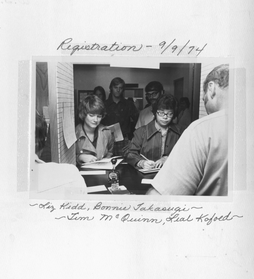 A photograph of WAMI students registering for the program with names of students.